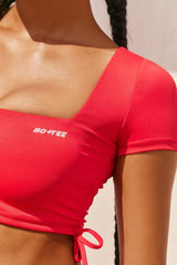 Ambition Slinky Cut Out Crop Top in Red